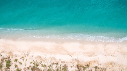 Top view aerial image from drone of an stunning beautiful sea landscape beach with turquoise water with copy space for your text.Beautiful Sand beach with turquoise water,aerial UAV drone shot