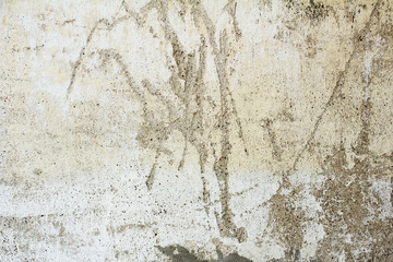 old shabby stucco parget wall with cracked structure