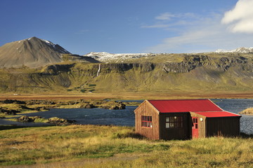 Icelandic landscapes are often decorated with free-standing buildings.