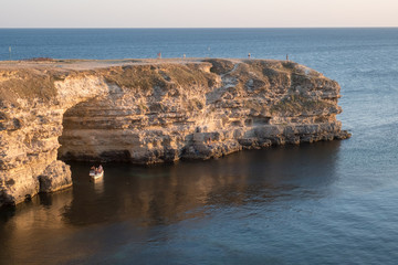 The Crimean Peninsula-Cape Tarkhankut summer is pure Black sea, rocky shore, evening light