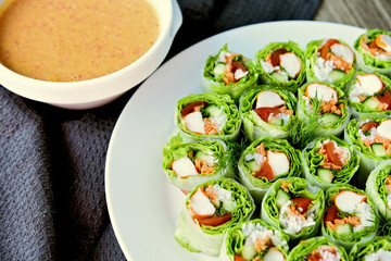 Salad roll with peanut spicy sauce healthy food menu..Mixed Vegetables wrapped with rice noodles and sauce.