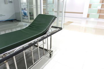 Bed stretcher or patient bed in the hospital corridor.