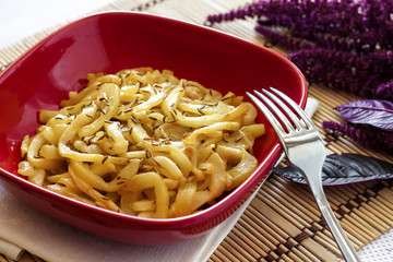 Fried ripe zucchini with cumin seeds