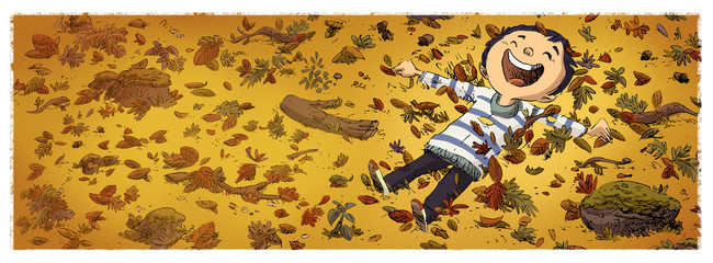 niño tumbado entre las hojas en otoño