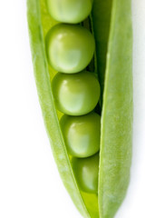 Pod with fresh green peas.