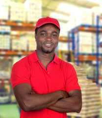 Handsome man working at logistics warehouse