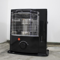 Black kerosene heater in a white background