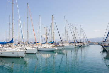 Fototapeta premium Marina port ships yachts in Agios Nikolaos bay, Crete, Greece