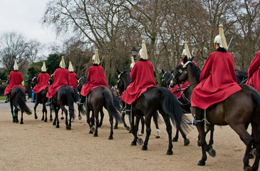 Horseguards ride toward Buckingham Palace for the changing of the guard