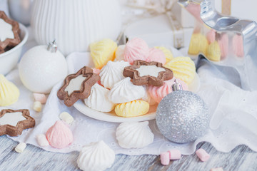 Marshmallow, cookies, meringues and different Christmas decorations