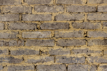 The walls are created from natural clay. Clay into a square to build a wall or a house.