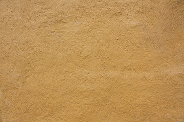 The walls are created from natural clay and painted brown again.