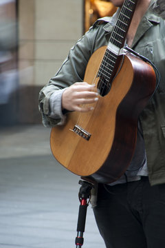 Sydney Australia, busker playing guitar in street