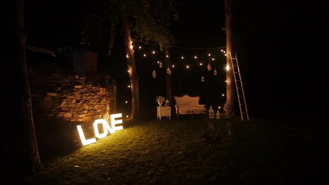 HD Shooting of the decorated yard for wedding at night with lights