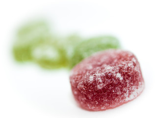 Macro close up of colourful round Jelly Candy Sweets on a white background