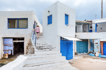 Fototapeta na wymiar Blue and white architecture in Firopotamos, a fishing port on Milos. Cyclades Islands, Greece