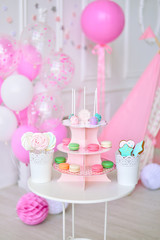Children birthday party. Decorations for holiday party. A lot of balloons pink and white colors. 
