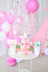 Children birthday party. Decorations for holiday party. A lot of balloons pink and white colors. 