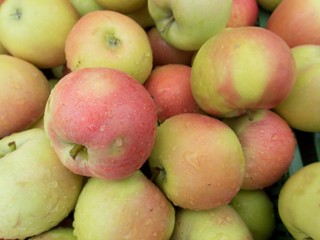 fresh apples and pears on a market