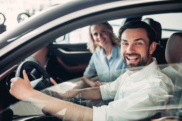 couple sitting in new car