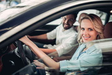 couple sitting in new car