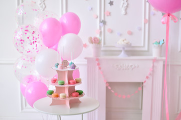 Children birthday. Girl birthday. Decorations for birthday party. A lot of balloons pink and white colors. 