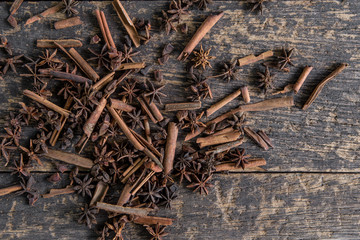 Star anise and Cinnamon on old wooden boards
