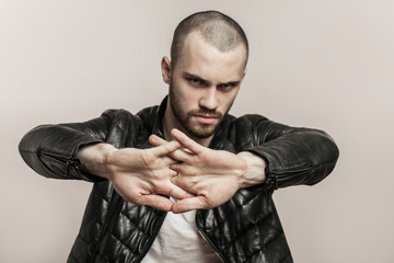 strong brutal man flexing fingers. handsome man doing exercise for fingers. close-up photo.male...