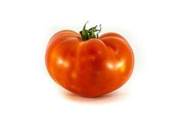 Fresh red tomato isolated on white background
