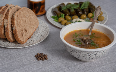 Harcho - national Georgian beef soap with rice. walnuts and clapping or tartar sauce