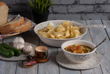 Pasta in meat sauce with stewed vegetables