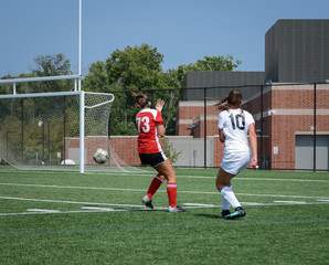 Girl crossing the ball