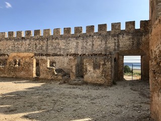 Brik wall of old castle ruins in Frango at Crete island, Greece