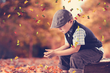Kind im Herbst - obrazy, fototapety, plakaty