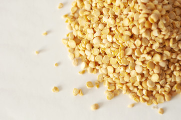 isolated photo of dry yellow peas. white background