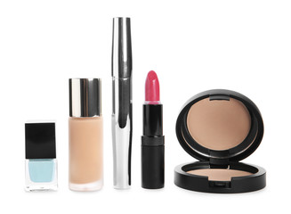 Set of makeup products on white background