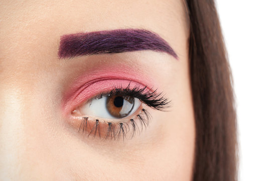 Young woman with dyed eyebrow and creative makeup, closeup