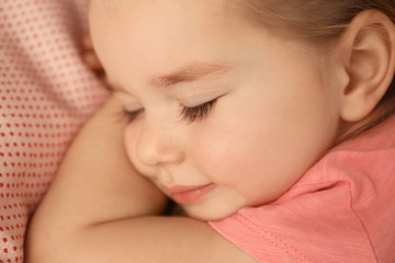 Cute little girl sleeping in bed at home, closeup