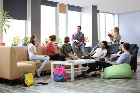 Students resting together in campus building