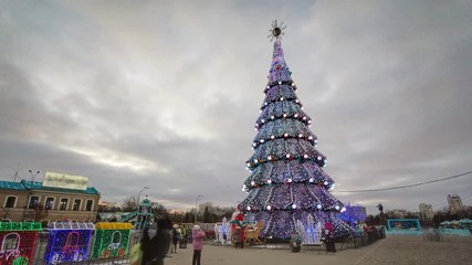 The Central city Christmas tree at the liberty square timelapse in Kharkov, Ukraine. - Powered by Adobe