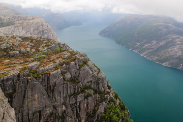 Landscape of mountain and river background at the hiking way to Preikestolen landmark, famous and popular natural travel destination in Norway.