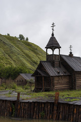 Fototapeta premium old wooden church on the landscape