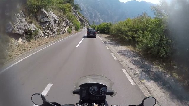 Driving on rural road mountains of Montenegro, touring adventures, pov shot on action camera