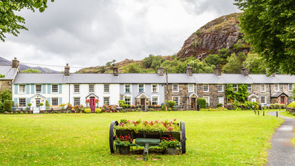 Tarditional stone cottages in Beddgelert in the heart of Smowdonia National Park in Gwynedd, Wales,...