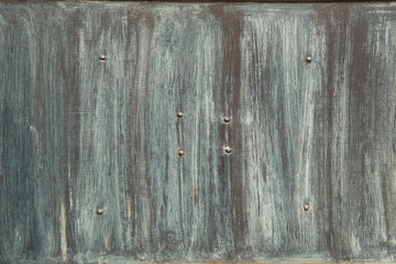 Metallplatte mit runden Nieten mit Anstrich in grau türkis 