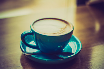Hot Latte on the wooden table