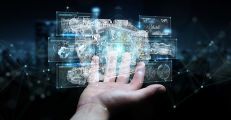 Businessman using wireframe holographic 3D digital projection of an engine