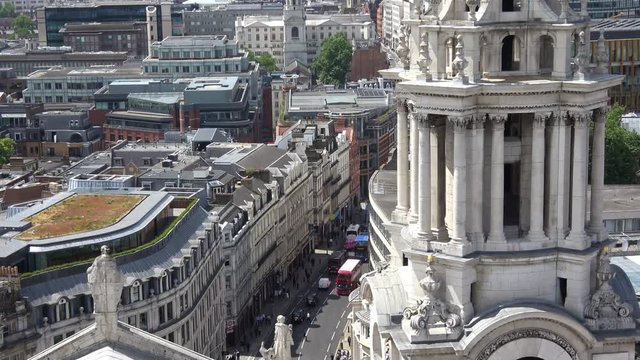 Aerial view of cityscape of  London, with part of tower and roof of  St. Paul Cathedral.