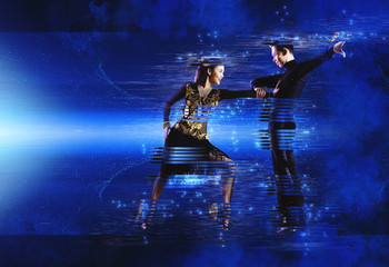 Pair of dancers dancing ballroom