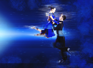 Pair of dancers dancing ballroom